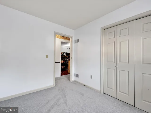 an empty room with closet