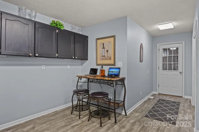 a workspace with wooden floor