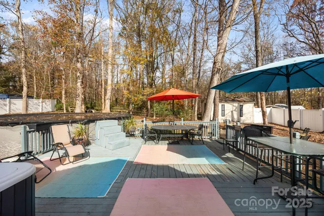 swimming pool view with a seating space
