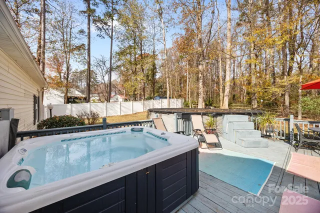 a view of outdoor kitchen with seating area