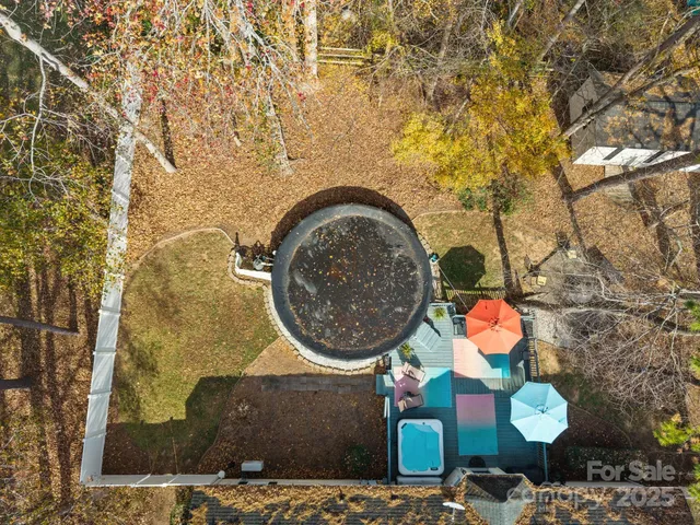 a backyard of a house with a stove and a table