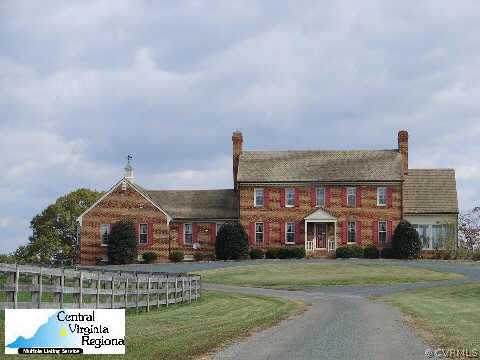440 Three Chopt Road Manakin-Sabot, VA 23103 - Photo 1 of 5 a front view of a house with garden