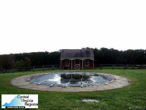 440 Three Chopt Road Manakin-Sabot, VA 23103 - Photo 4 of 5 a view of a house with a big yard