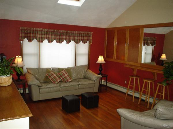 7 Lansdowne Road Arlington, MA 02474 - Photo 12 of 24 a living room with furniture and a wooden floor
