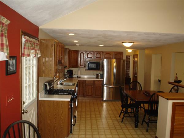 7 Lansdowne Road Arlington, MA 02474 - Photo 14 of 24 a view of a dining room with furniture