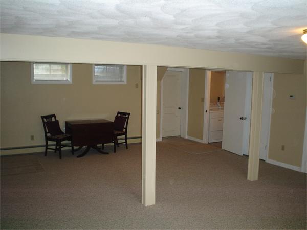 7 Lansdowne Road Arlington, MA 02474 - Photo 15 of 24 a view of a livingroom with workspace and a window