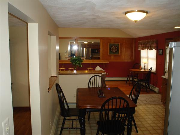 7 Lansdowne Road Arlington, MA 02474 - Photo 10 of 24 a view of a dining room with furniture and window