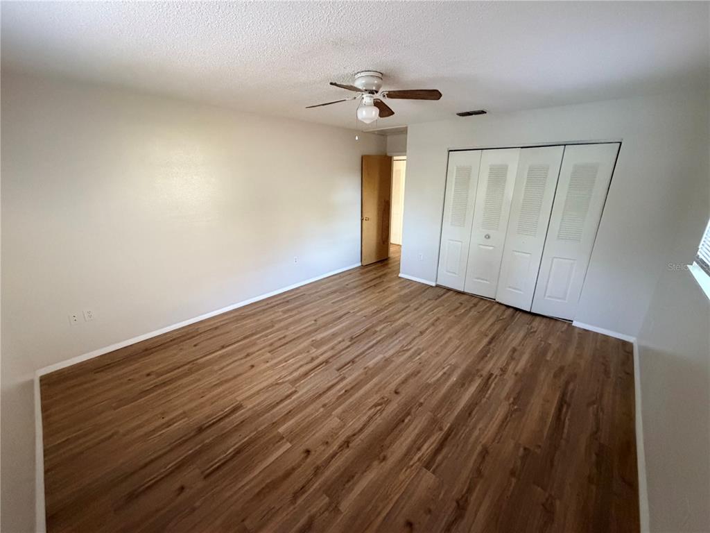 5604 Montana Avenue New Port Richey, FL 34652 - Photo 10 of 10 a view of empty room with wooden floor