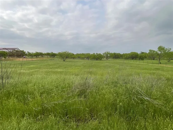 a view of an ocean and a mountain