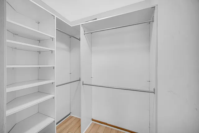 a view of an empty walk in closet