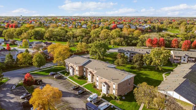 an aerial view of a house with a garden