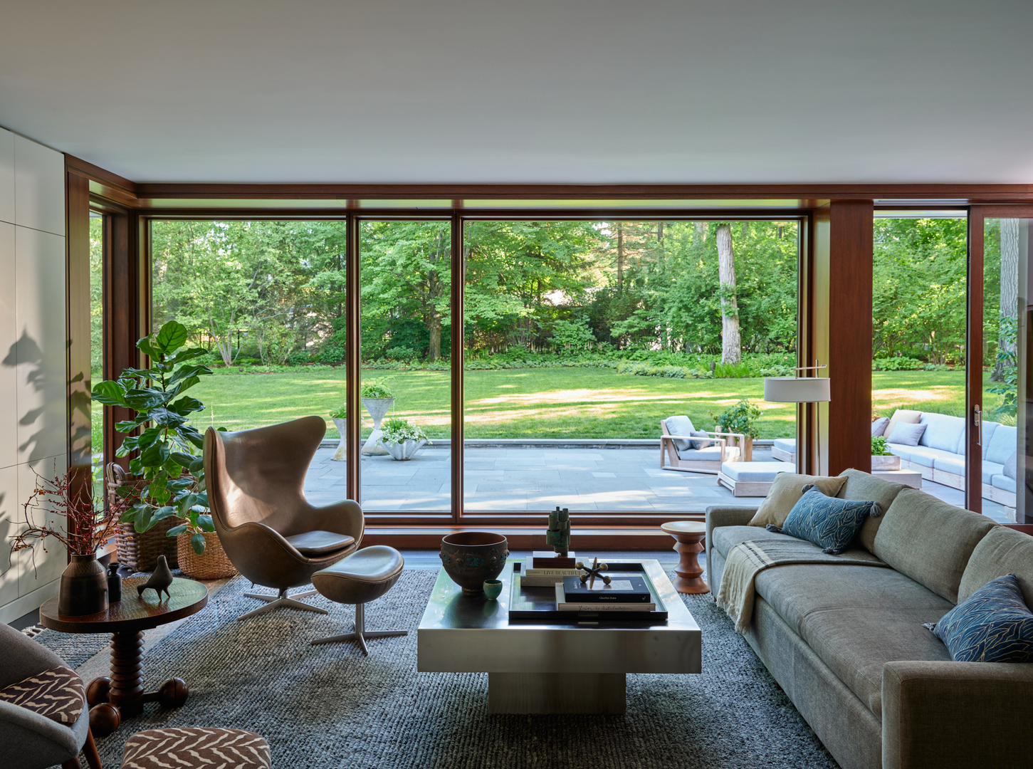 516 Sheridan Road Glencoe, IL 60022 - Photo 20 of 45 a living room with furniture and floor to ceiling windows