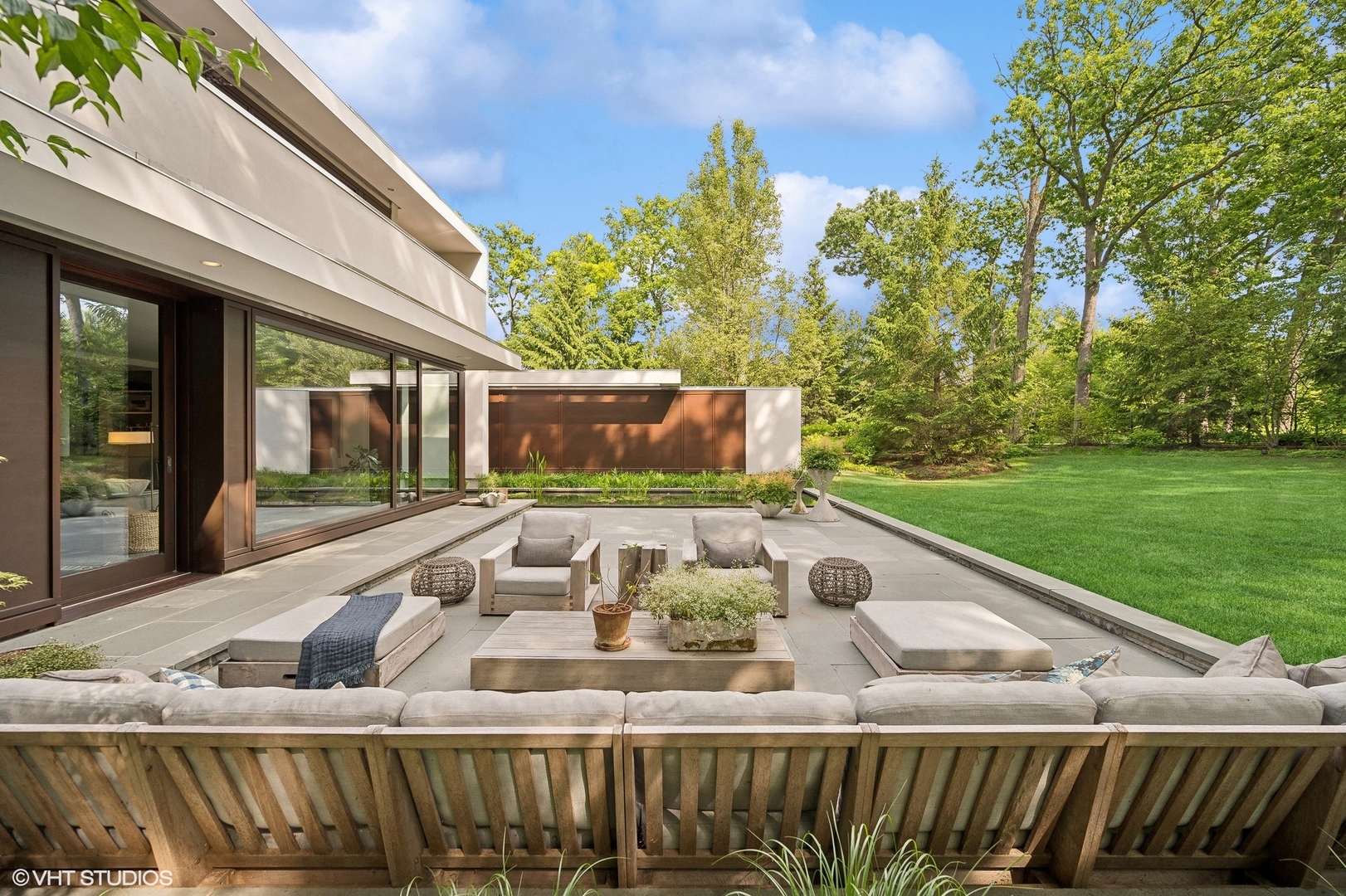 516 Sheridan Road Glencoe, IL 60022 - Photo 21 of 45 a view of backyard with outdoor seating and green space