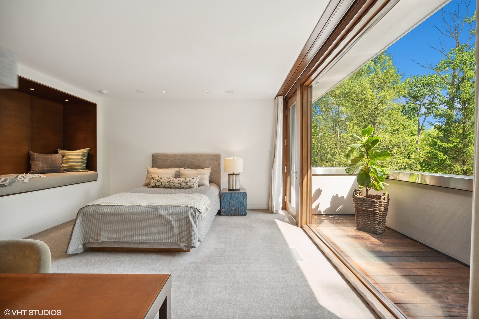 516 Sheridan Road Glencoe, IL 60022 - Photo 36 of 45 a bedroom with furniture and a flat screen tv