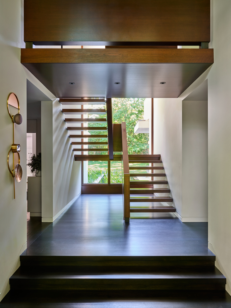 516 Sheridan Road Glencoe, IL 60022 - Photo 6 of 45 a view of entryway and hall with wooden floor