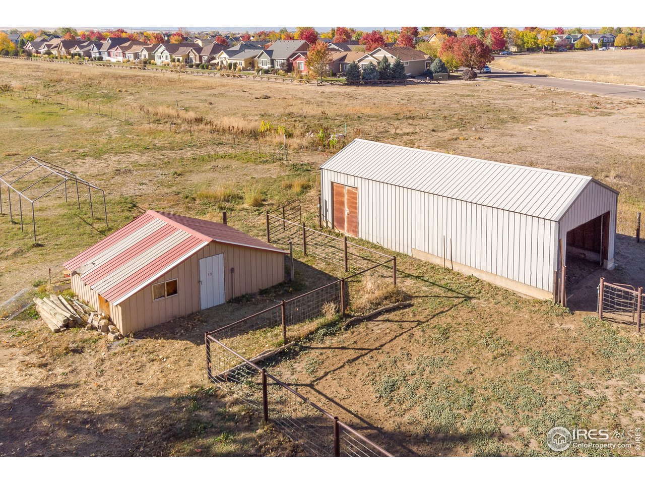 4579 Northeast County Line Road Erie, CO 80516 - Photo 20 of 38 a view of a lake with a mountain