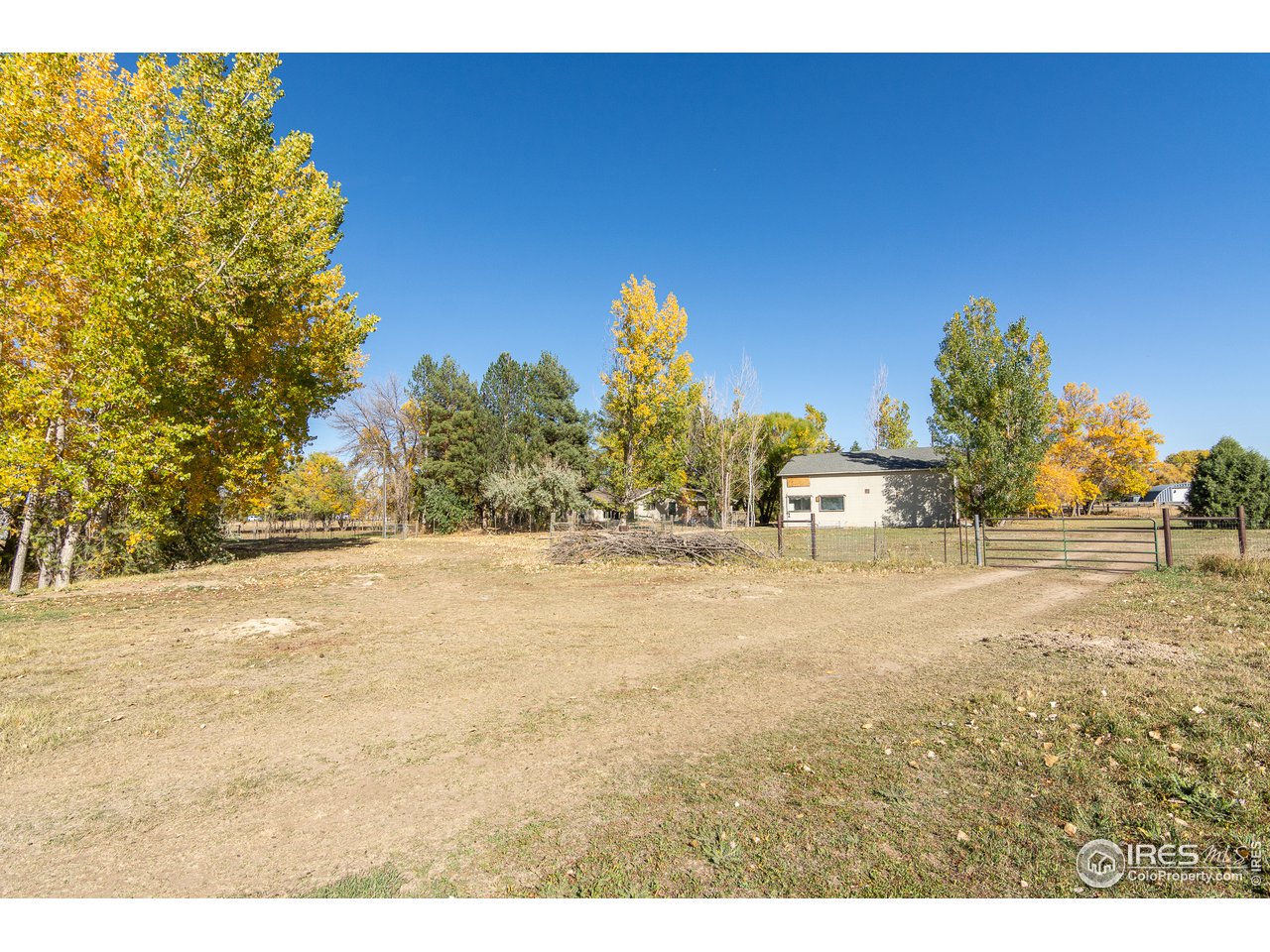 4579 Northeast County Line Road Erie, CO 80516 - Photo 26 of 38 a bathroom with a sink and a yard