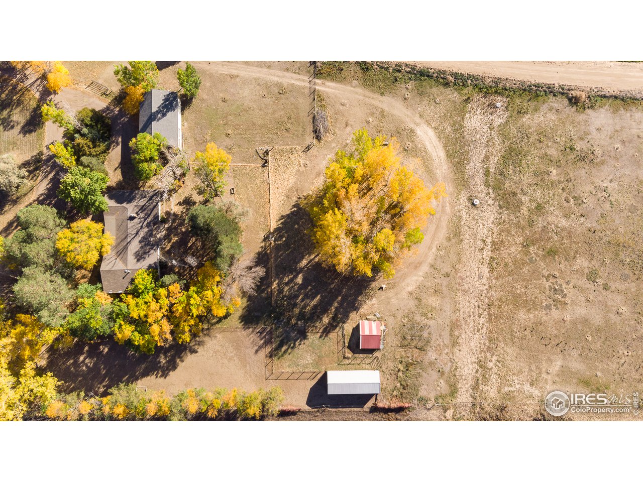 4579 Northeast County Line Road Erie, CO 80516 - Photo 32 of 38 a black and white photo of a lake