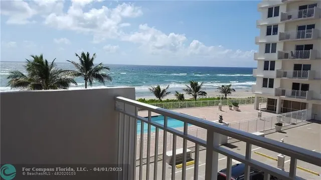 a view of balcony with furniture