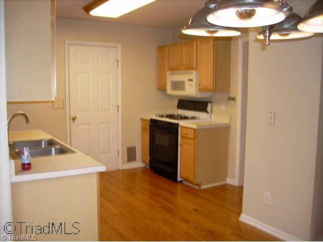 8115 Bartonshire Drive Oak Ridge, NC 27310 - Photo 8 of 9 Other. Kitchen View from Breakfast Room