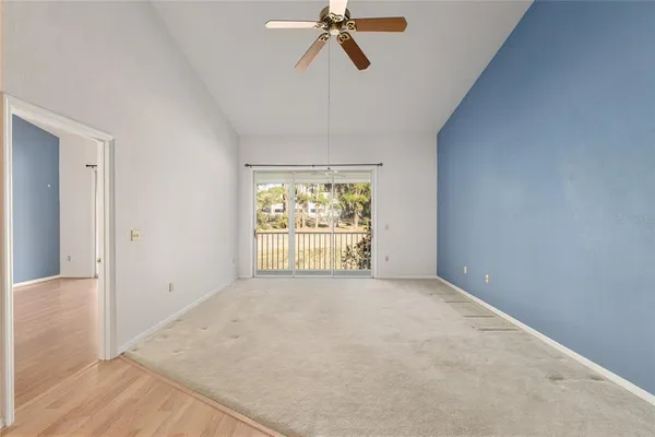 a view of an empty room with a window