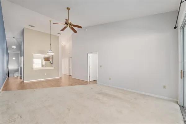 a view of a hallway with windows
