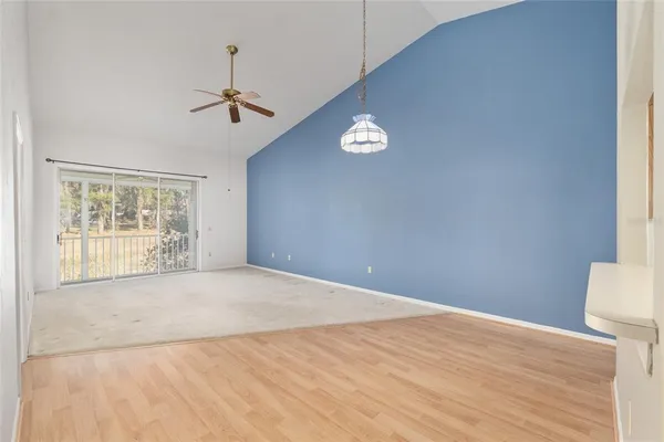 a kitchen with a sink stove and microwave