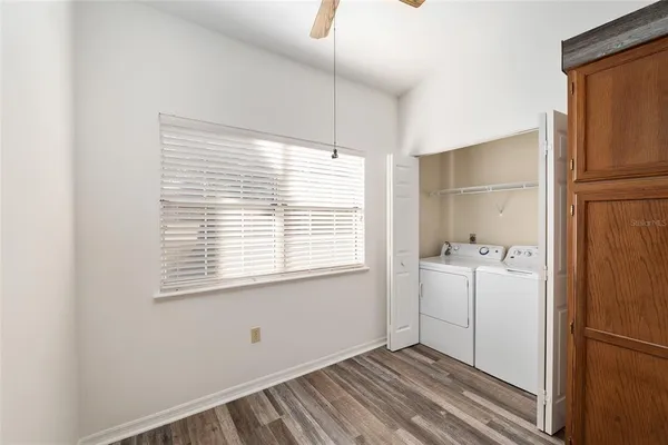 a bathroom with a toilet and a bathtub