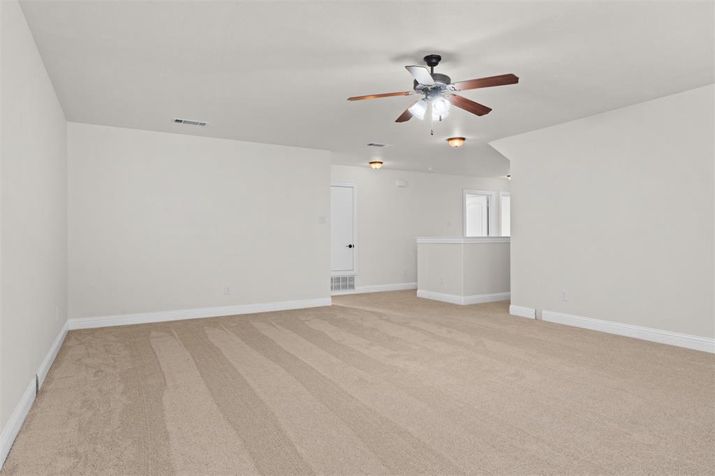 2322 Trace Ridge Drive Weatherford, TX 76087 - Photo 23 of 30 carpet and ceiling fan