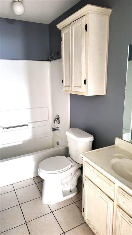 2405 Redbud Avenue McAllen, TX 78504 - Photo 4 of 5 a bathroom with a toilet a sink and mirror