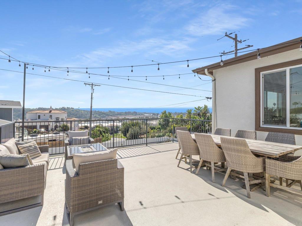 1858 Avocado Road Oceanside, CA 92054 - Photo 2 of 42 a view of a patio with couches and table and chairs