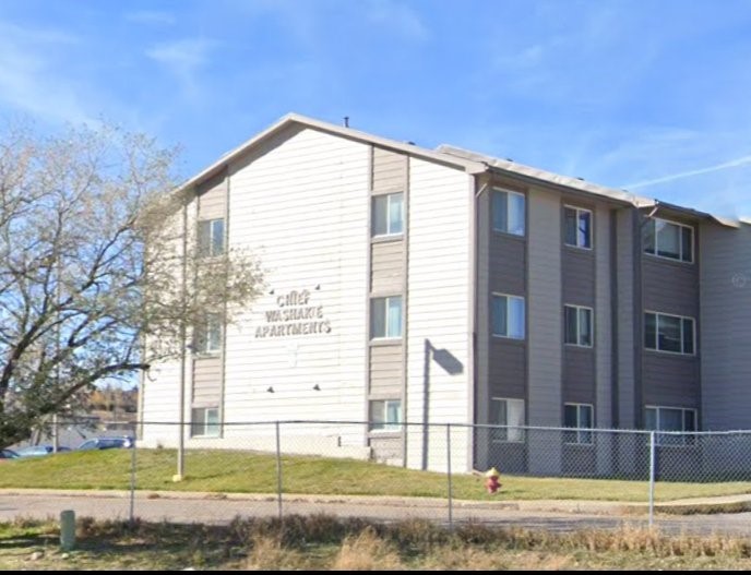 82 East Hayden Avenue, Unit 8 Evanston, WY 82930 - Photo 2 of 8 a view of a house with a yard