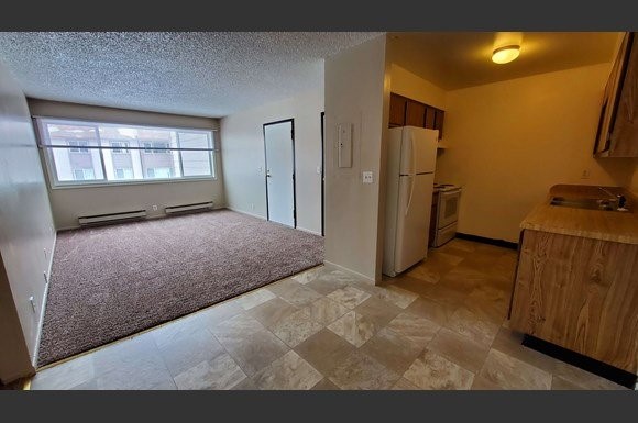 82 East Hayden Avenue, Unit 8 Evanston, WY 82930 - Photo 4 of 8 a view of hallway with windows