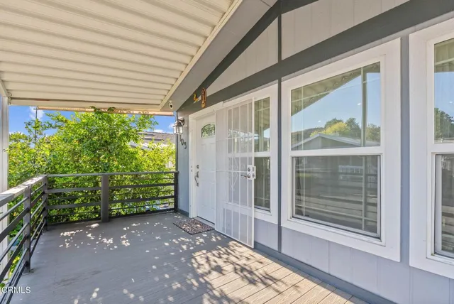 a view of a door and a window