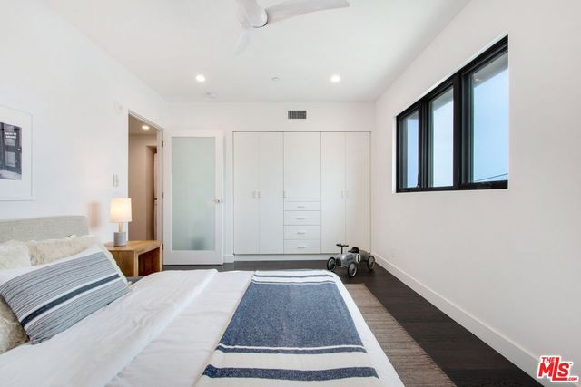 a view of a hallway with washer and dryer