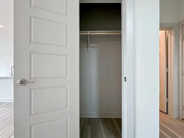 a bathroom with a sink toilet and a mirror