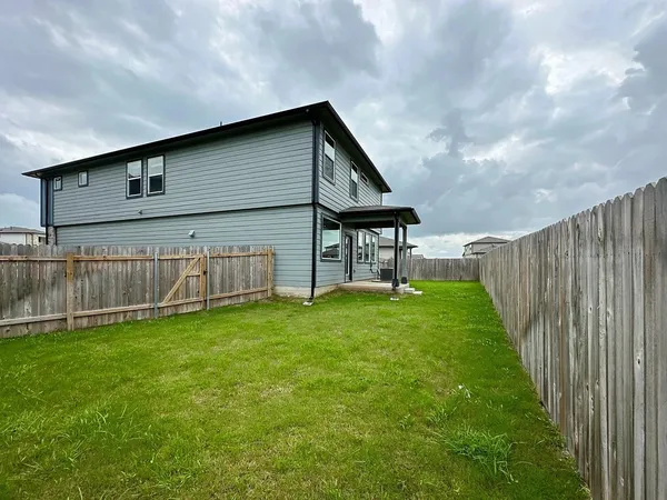 a view of a backyard with a garden
