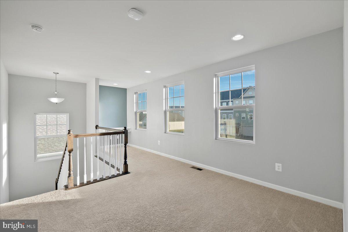 115 Interlace Way Stephenson, VA 22656 - Photo 17 of 45 an empty room with windows and closet