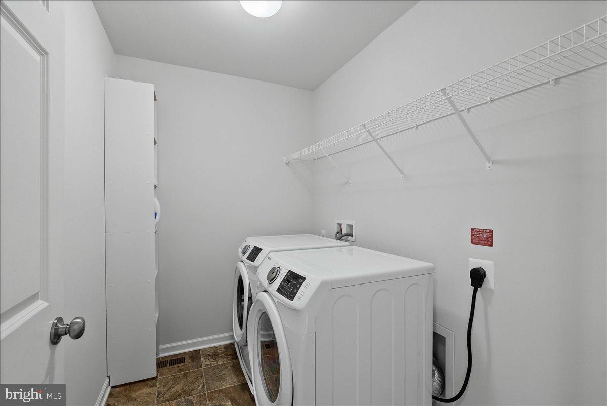 115 Interlace Way Stephenson, VA 22656 - Photo 25 of 45 a utility room with dryer and washer