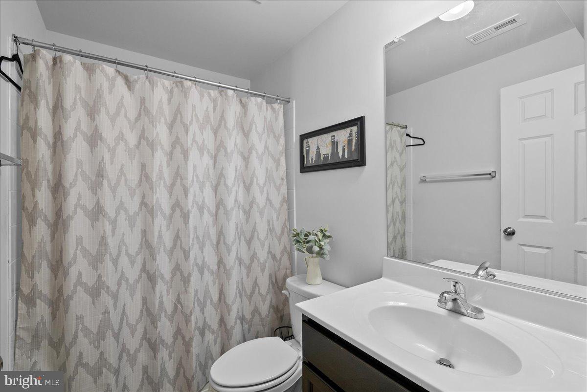 115 Interlace Way Stephenson, VA 22656 - Photo 32 of 45 a bathroom with a sink toilet and shower