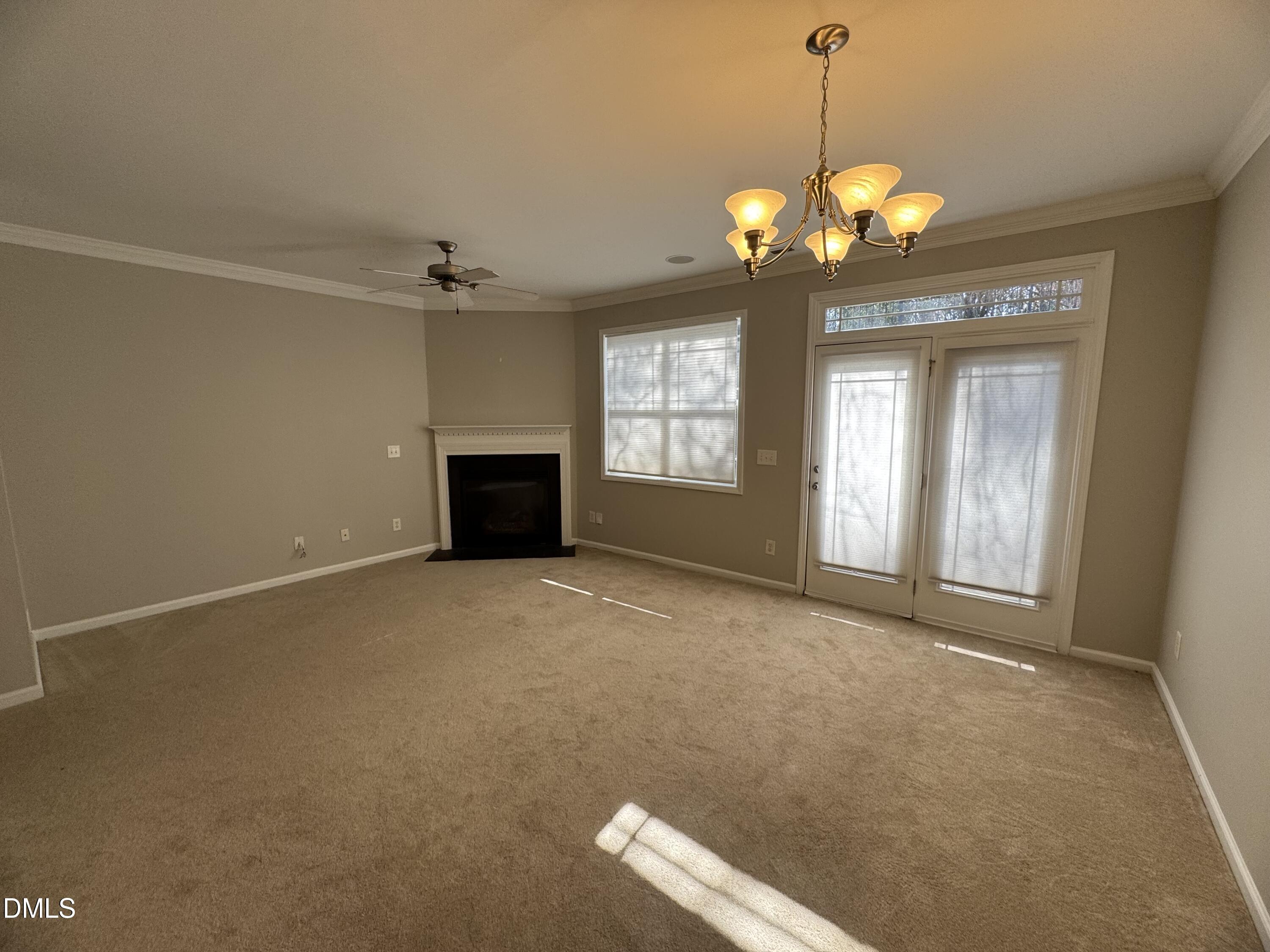 4705 Lawhorn Street Raleigh, NC 27606 - Photo 2 of 13 a view of an empty room with a window
