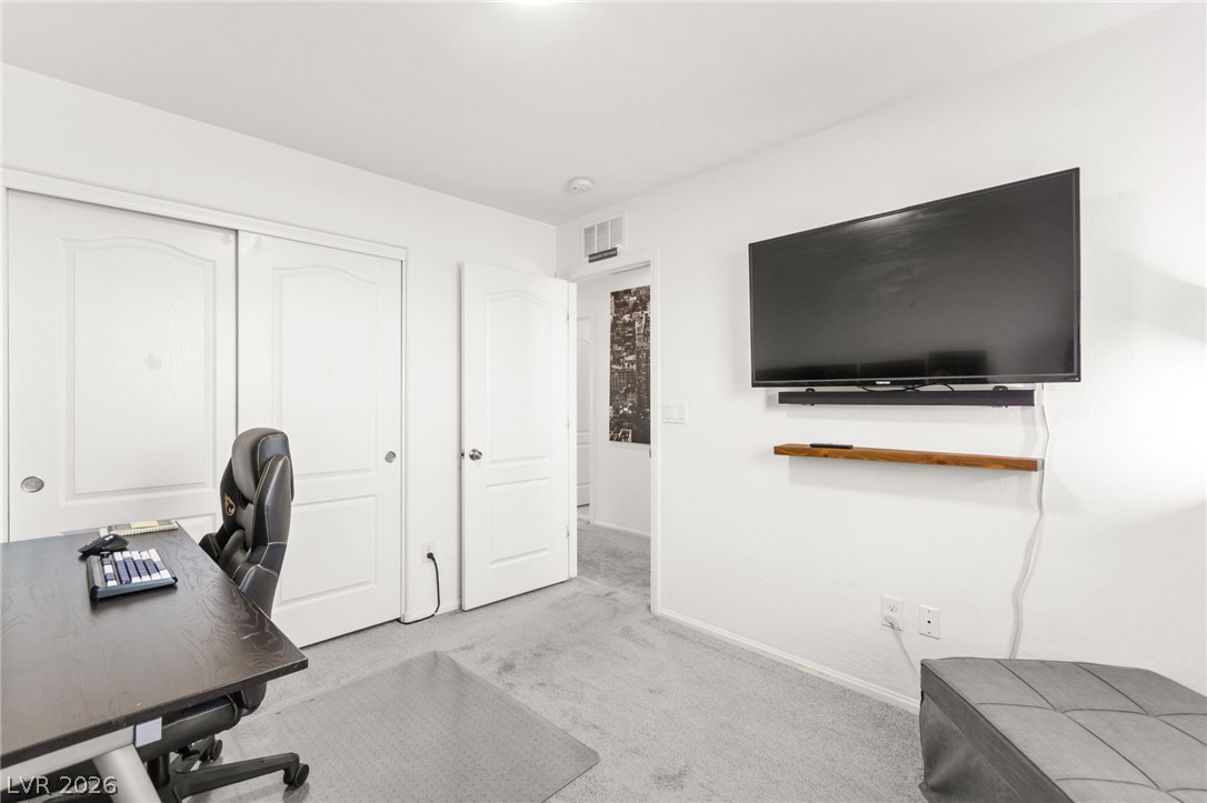 6435 Point Isabel Way Las Vegas, NV 89122 - Photo 40 of 57 Functional office space includes ample storage and neutral flooring for versatile use.