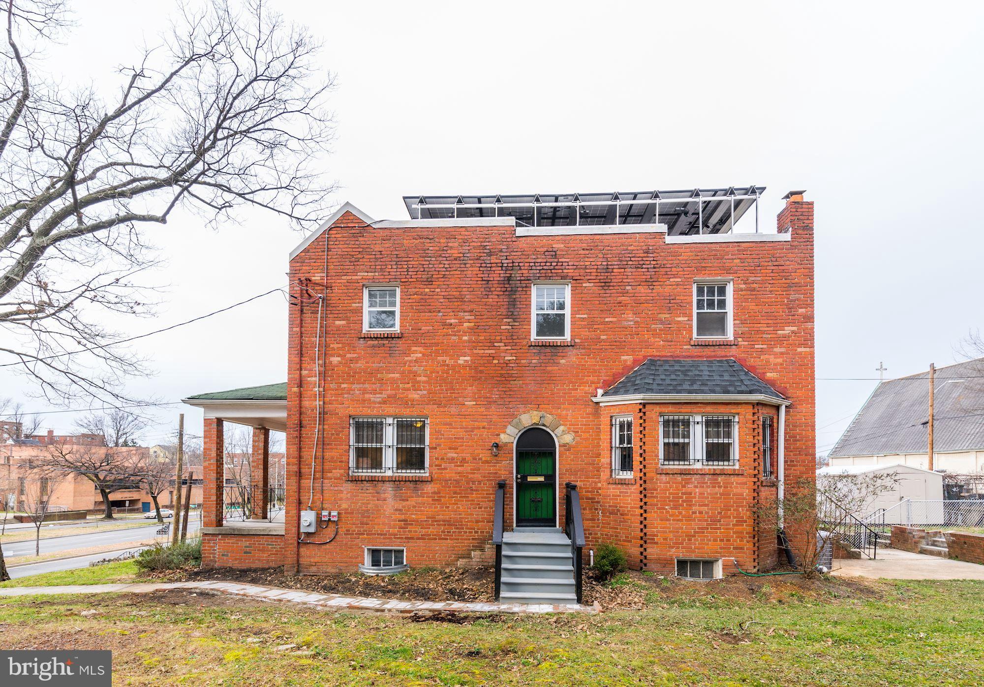4944 East Capitol Street Northeast Washington, DC 20019 - Photo 3 of 26 Story book style arched door welcomes guests.