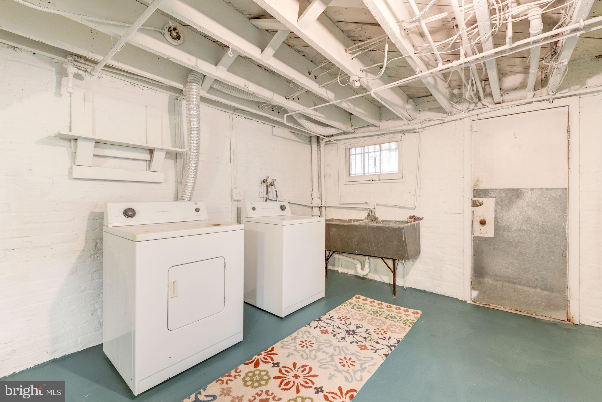 4944 East Capitol Street Northeast Washington, DC 20019 - Photo 24 of 26 Basement laundry with utility sink