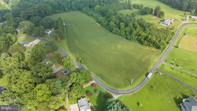 a view of an empty room and mountains