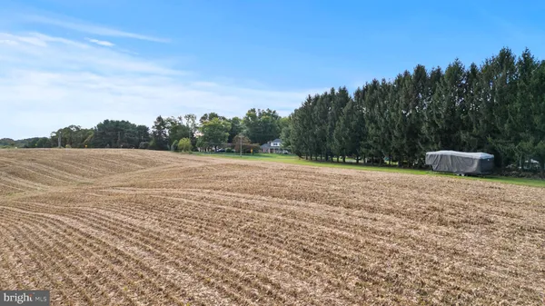 a view of a lake with a big yard