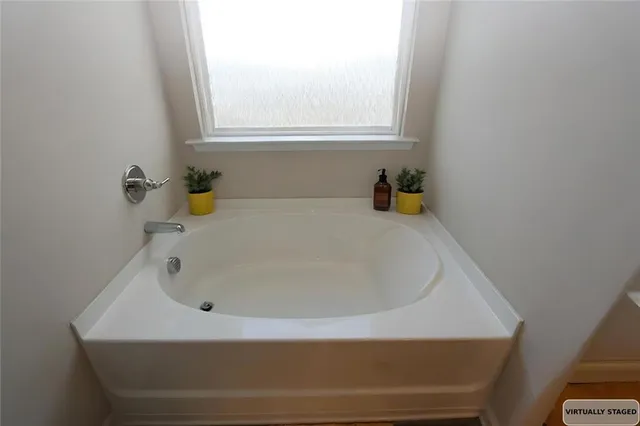 a bathroom with a bathtub