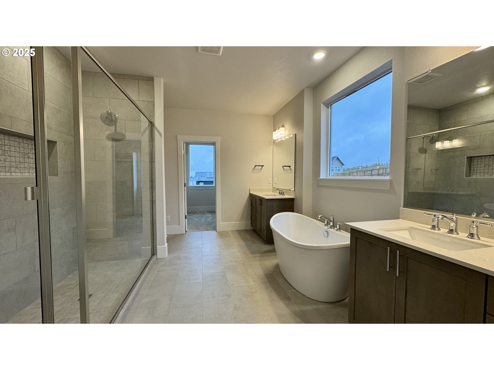 11728 Southwest Hayrick Terrace Beaverton, OR 97007 - Photo 21 of 25 a bathroom with a sink a toilet and shower