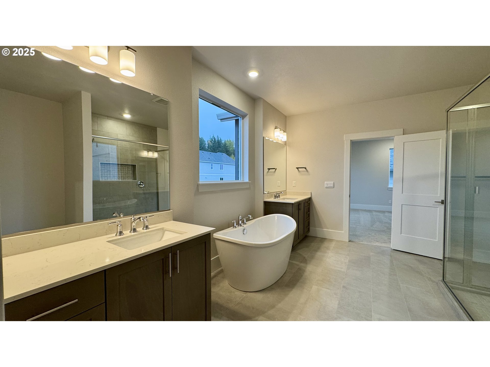 11728 Southwest Hayrick Terrace Beaverton, OR 97007 - Photo 22 of 25 a bathroom with a sink a toilet a mirror and shower