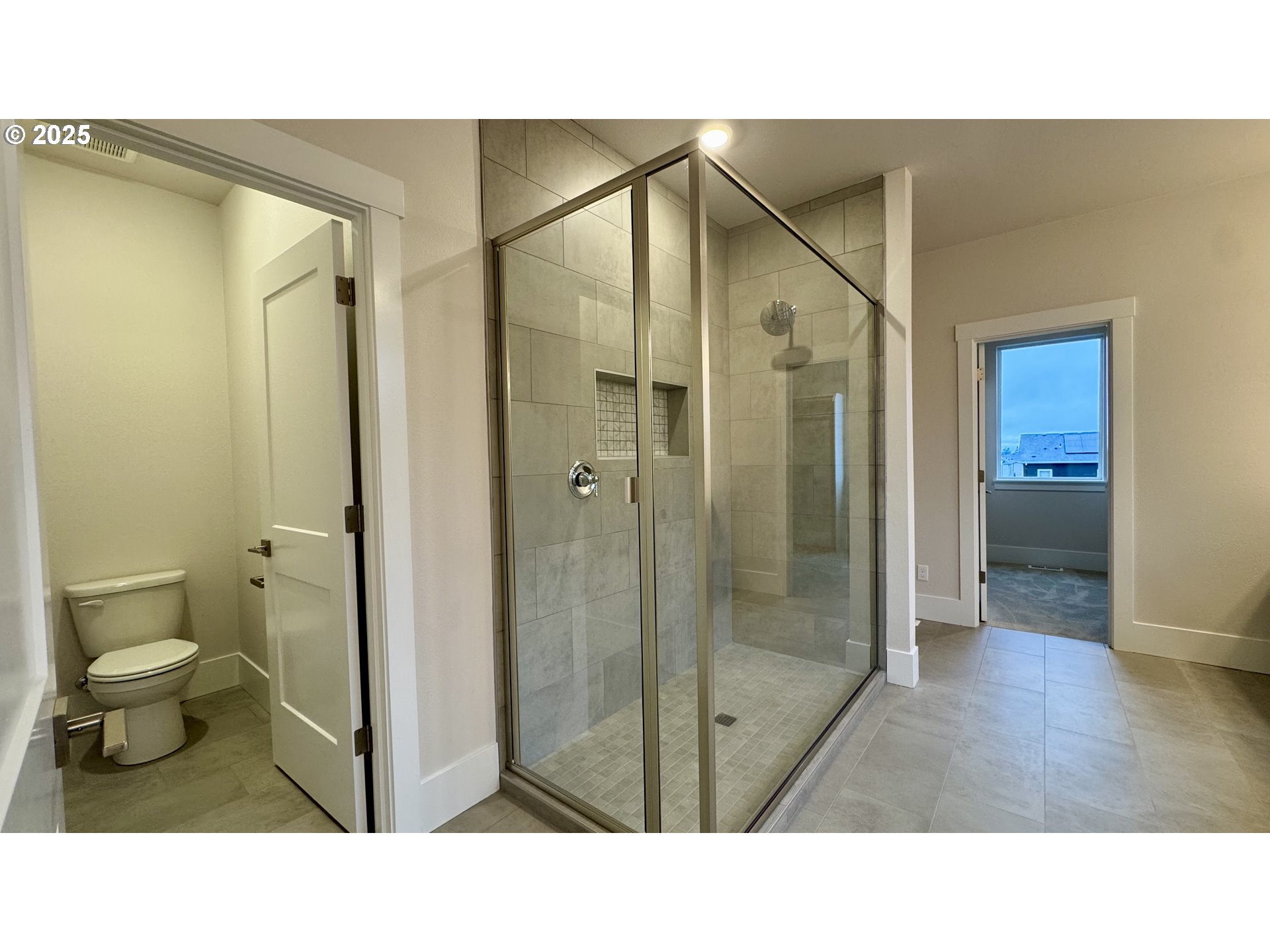 11728 Southwest Hayrick Terrace Beaverton, OR 97007 - Photo 24 of 25 a bathroom with a toilet a sink and shower